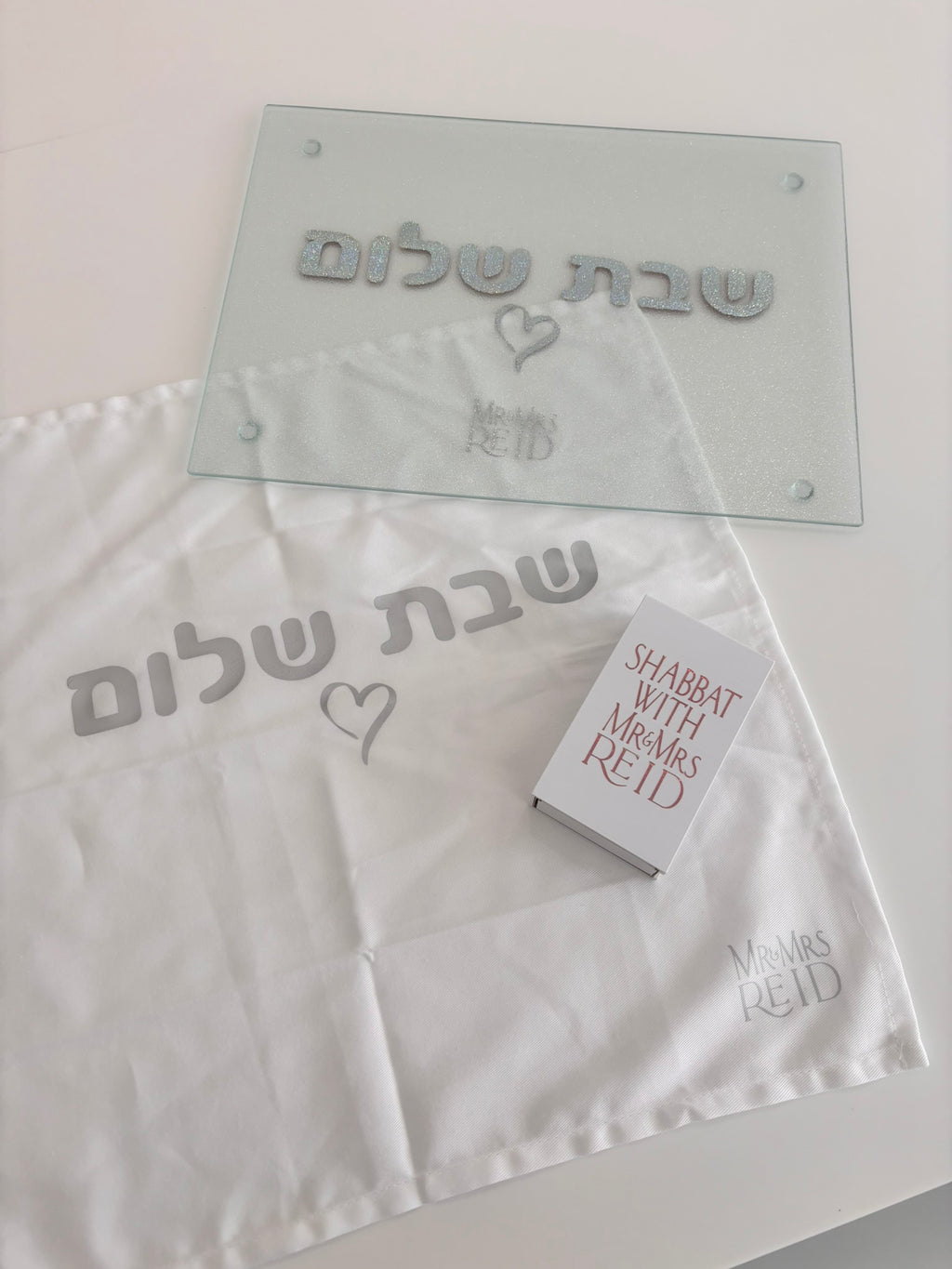Challah cover with a matching challah board and cover that says Shabbat with Mr and Mrs Reid