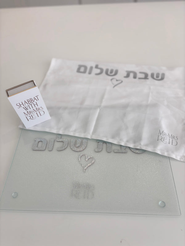 Challah cover with a matching challah board, cover and match box that says Shabbat with Mr and Mrs Reid