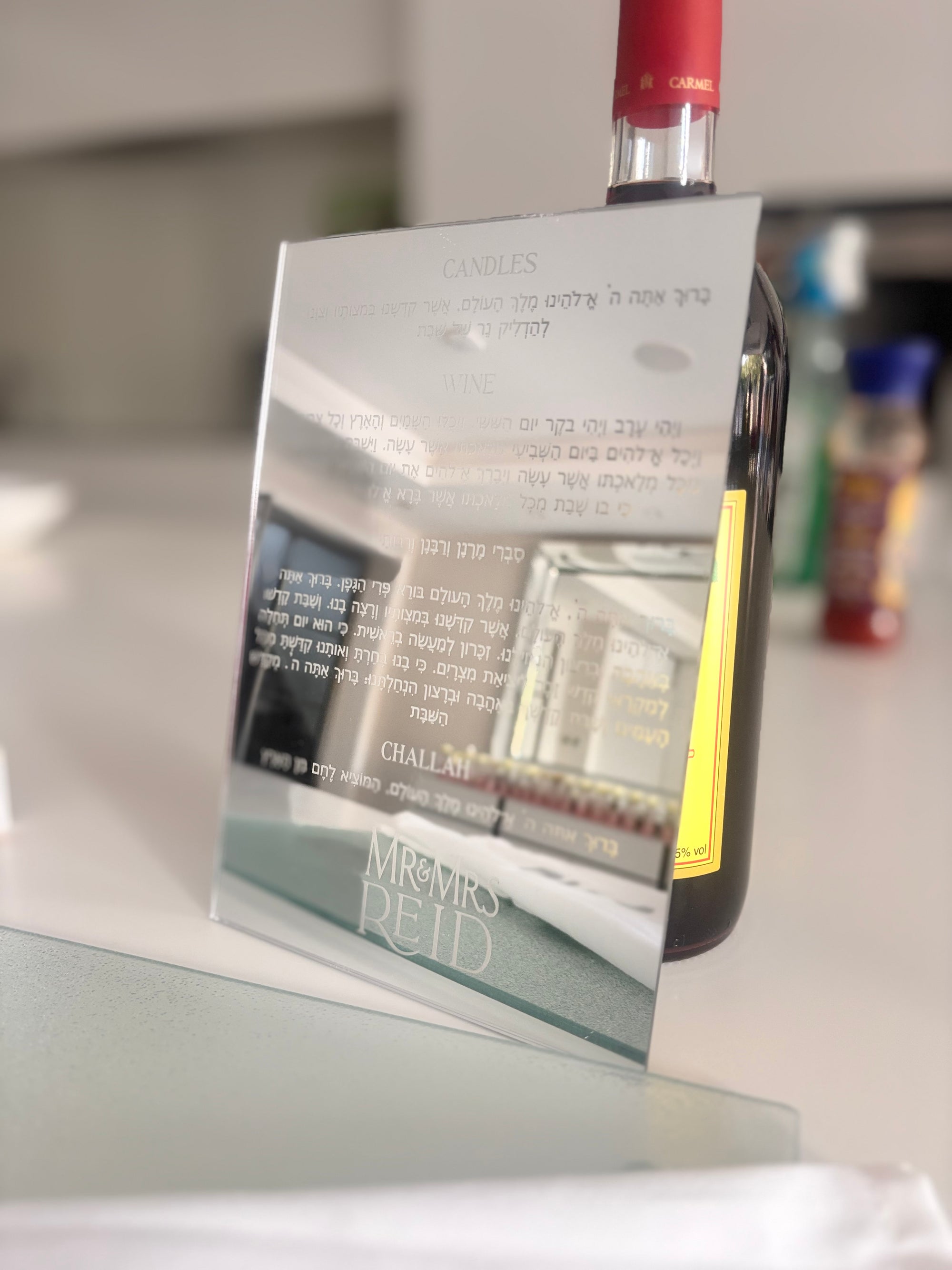 Clear acrylic faith gift with shabbat prayers on a white surface