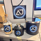 Personalised diffuser set with decorative items featuring a logo on a neutral background