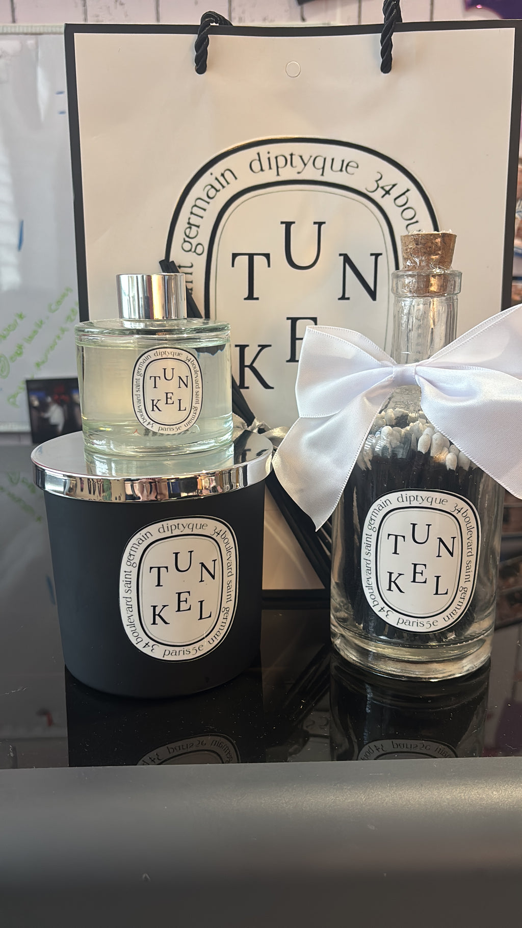Diptyque-style candle, diffuser and matchbox gift set.