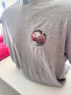 Grey event t-shirt with 'Bella' logo on a mannequin
