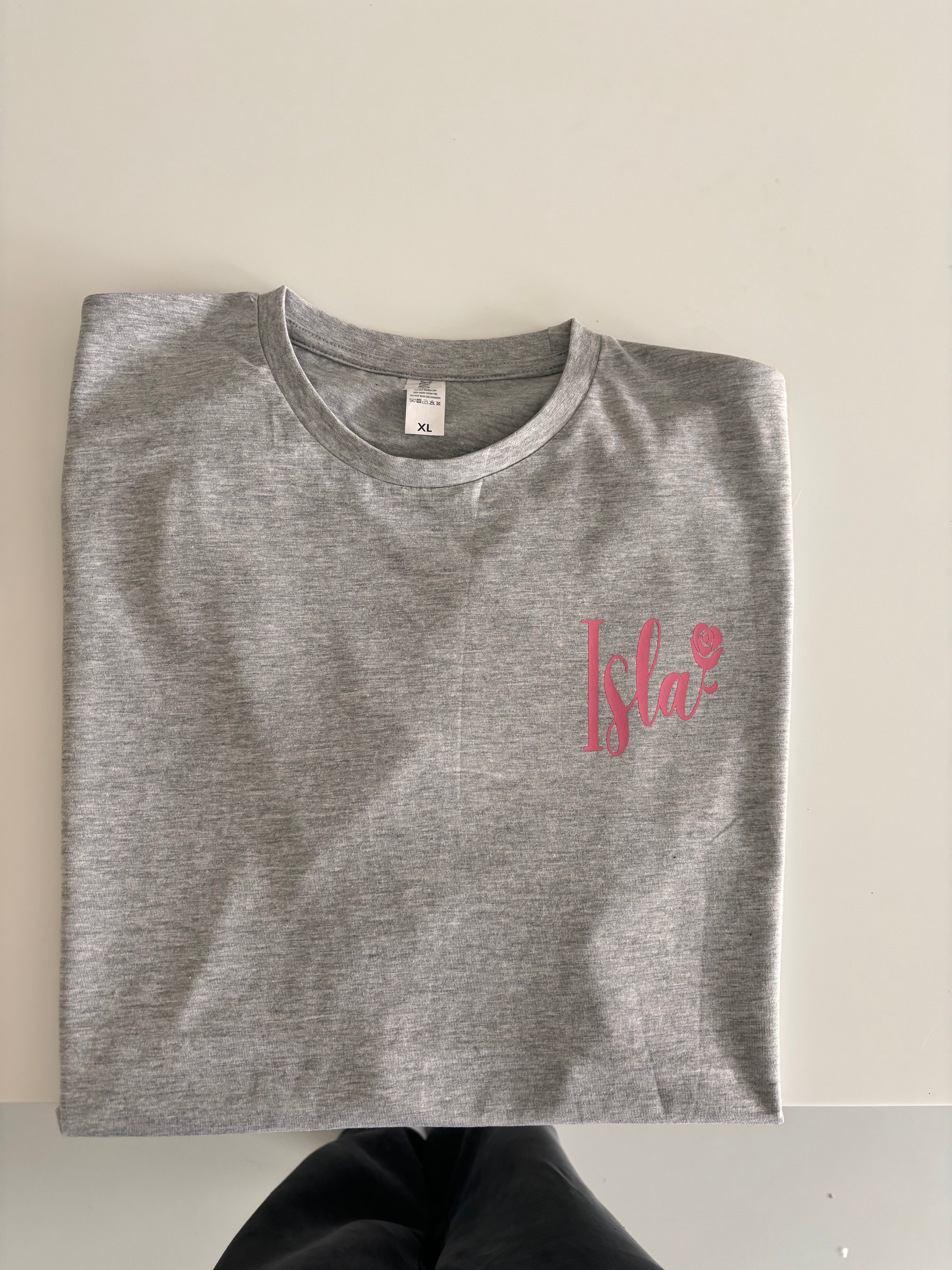 Grey event t-shirt with a red logo