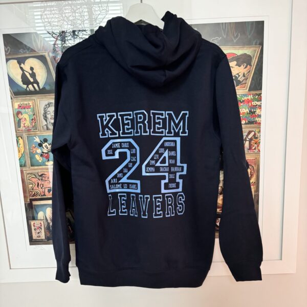 Black hoodie with 'KEREM 24 LEAVERS' text on the back, displayed against a wall with posters.