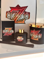 Branded black match box sleeve, candle and diffuser set that says "Z". 