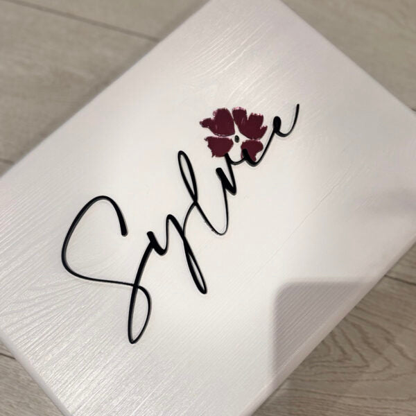 White memory box with 'Sophia' and a floral design printed on it.