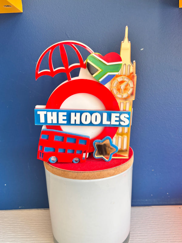 Personalised "The Hooles" London underground and South Africa themed cake topper