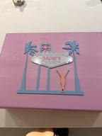 Pink keepsake box with cut-out designs and 'Welcome Sadie's' text on a white background
