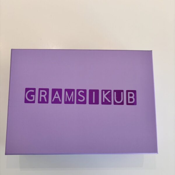 Purple personalised game with 'GRAMSIKUB' text on a light grey background