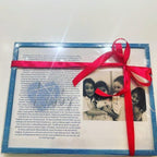 Framed speech gift with a photo of three children and a red ribbon on a white background with no acrylic.