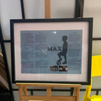 Framed speech gift with silhouette and text on a stand against a neutral background with acrylic