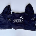 Three navy blue hoodies with 'Brooke' and butterfly designs on a white background