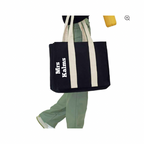 Black tote bag with 'Mrs Kalins' text on a white background