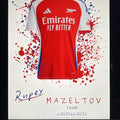 Red and white Arsenal football shirt gift with Emirates branding on a white background with red and blue splashes.