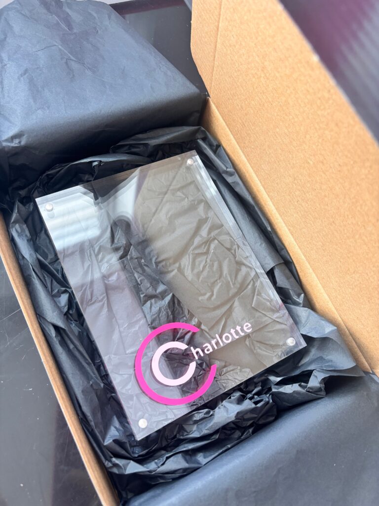 Acrylic photo frame with 'Charlotte' personalisation in pinks