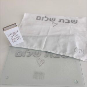 Challah cover with a matching challah board, cover and match box that says Shabbat with Mr and Mrs Reid