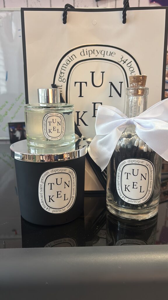 Diptyque-style candle, diffuser and matchbox gift set.