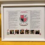 Framed speech gift with text and images, featuring a logo and multiple photos with no acrylic
