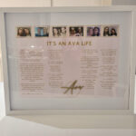 Framed speech gift with text and portraits titled 'It's an Ava Life' on a white surface with acrylic