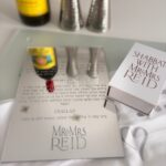 Challah board on mirrored glass with personalised prayer and Mr & Mrs Reid