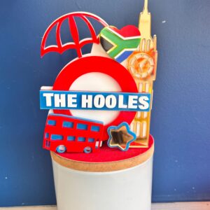 Personalised "The Hooles" London underground and South Africa themed cake topper