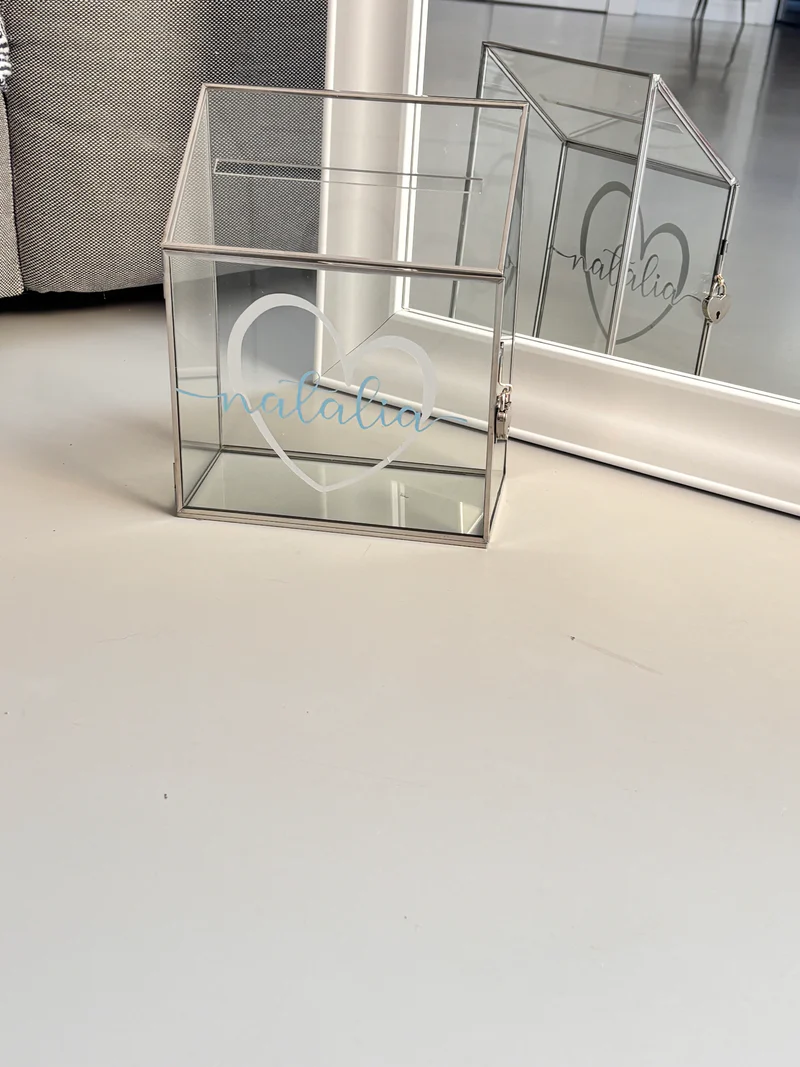 Clear_gift_card_box_on_a_white_wall_with_Natalia_personalised_branding.